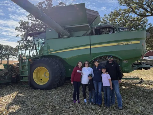 Gov Reynolds with farm family